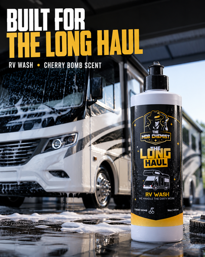 Long Haul RV Wash bottle displayed in front of a freshly washed motorhome, with the headline ‘Built for the Long Haul.